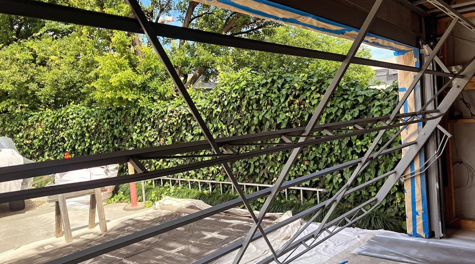 Garage door prepped and masked for respray, Adelaide Hills